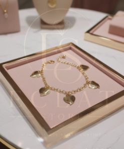 pulsera con dijes de tréboles