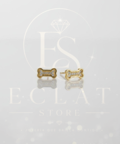 aretes tipo topo con diseño de estrella y circonias